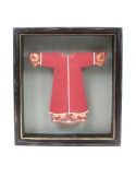 frame with red tunic